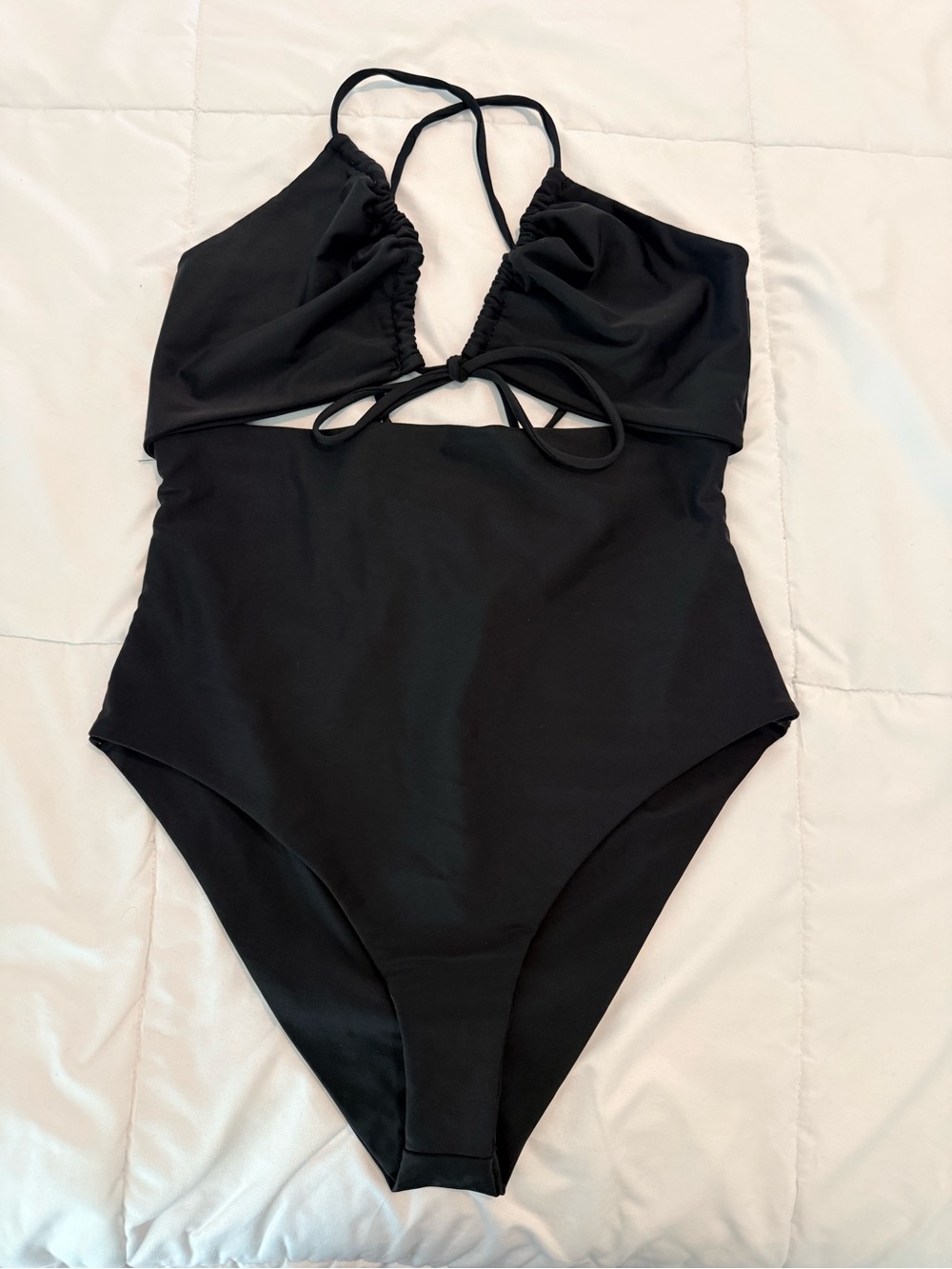 BECCA black one-piece swimsuit in Size Medium.